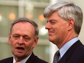 Former Finance Minister John Manley, right, in 2002 with then Prime Minister Jean Chretien.