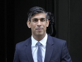 Britain's Prime Minister Rishi Sunak leaves 10 Downing Street to attend the weekly session of Prime Ministers Questions in Parliament in London, Wednesday, Jan. 11, 2023.
