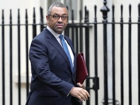 Britain's Foreign Secretary James Cleverly arrives in Downing Street to attend a cabinet meeting in London, Tuesday, Dec. 13, 2022.