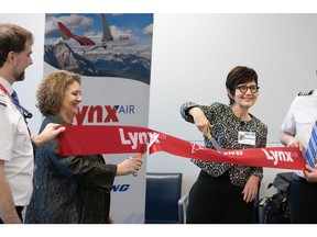 Lynx Air CEO, Merren McArthur is joined by Greater Toronto Airports Authority VP of Stakeholder Relations and Communications, Karen Mazurkewich for an official ribbon cutting celebration at Toronto Pearson Airport.  - Photo Credit Peyton Stikeleather