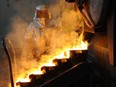 A refiner pours bars of gold at Agnico-Eagle's Mines Ltd.'s Meadowbank mine facility in Meadowbank Mine, Nunavut.