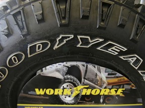 FILE - A Goodyear tire sits on display at a tire shop on Feb. 12, 2014, in South Euclid, Ohio. A federal grand jury in Los Angeles is gathering evidence in a criminal investigation of Goodyear recreational vehicle tires that the government blames for crashes that killed eight people and injured dozens of others. The grand jury subpoenaed Arizona lawyer David Kurtz on Jan. 4, 2023, seeking all documents and deposition transcripts in a lawsuit he filed against the Akron, Ohio, tire maker.