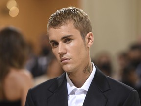 FILE - Justin Bieber attends The Metropolitan Museum of Art's Costume Institute benefit gala on Sept. 13, 2021, in New York. Bieber's publishing rights, copyright ownership and all rights to his entire music catalog are now under Hipgnois. The deal reportedly cost $200 million which is one of the biggest sales for a musician as young as Bieber, who is 28 years old.