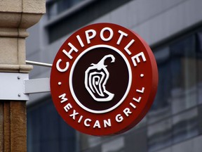 FILE - A sign for the Chipotle restaurant in Pittsburgh's Market Square is pictured Feb. 8, 2016. Restaurants are beginning the new year with a recurring problem: labor shortages. Chipotle said Thursday, Jan. 26, 2023, that it is looking to hire 15,000 people in North America to ensure its stores are staffed up ahead of its busy spring season.