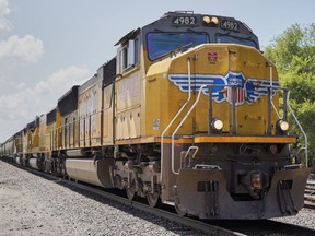 FILE - A Union Pacific train travels through Union, Neb., July 31, 2018. Union Pacific's latest attempt to move toward cutting its train crews down to one person remains on hold because of the longstanding safety concerns of the union that represents conductors.