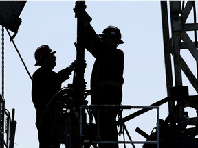 Oil workers on a rig