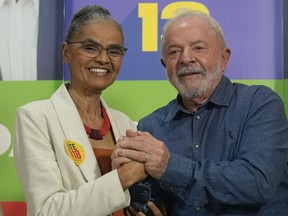 FILE - Brazil's former President Luiz Inacio Lula da Silva, right, and congressional candidate Marina Silva, campaign in Sao Paulo, Brazil, Monday, Sept. 12, 2022. Environmentalists, Indigenous people and voters sympathetic to their causes were important to Lula's narrow victory over former President Jair Bolsonaro. Now Lula is seeking to fulfill campaign pledges he made to them on a wide range of issues, from expanding Indigenous territories to halting a surge in illegal deforestation.