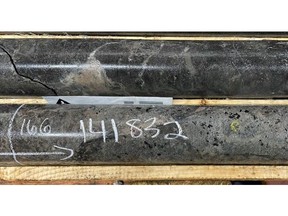 South Rim Zone.  Top Photo: carbonatite dyke (phoscorite) with REE-rich apatite and monazite matrix, and small biotite phenocrysts at 166m with 2.85% TREO including 28.5% PMREO within 261m at 0.7% TREO. Bottom photo: core bench photo of carbonatite (sovite) dykes and vein breccia observed over tens of metres in HK22-019. This is the first observation of apatite (orange-pink) in a sovite (white calcite carbonatite) at H-K. This new occurrence of mineralized sovite is a proximal indicator to the intense REE mineralization in holes 15 and 20.