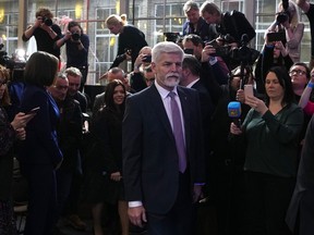 Presidential candidate Petr Pavel arrives to address media after announcement of the preliminary results for the first round of presidential election in Prague, Czech Republic, Saturday, Jan. 14, 2023.