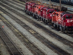 Canadian Pacific Rail locomotives sit idle at the company's Port Coquitlam yard east of Vancouver, B.C., on May 23, 2012. Canadian Pacific Railway Ltd. will report its fourth-quarter financial and operating results after the close of financial markets on Tuesday.