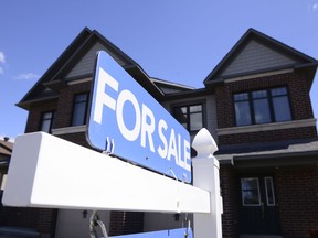 A new home is displayed for sale in a new housing development in Ottawa on Tuesday, July 14, 2020. Prospective buyers have lamented the torrid pace Canada's real estate market has moved at in recent years, but many feel 2023 may be the year their luck changes.