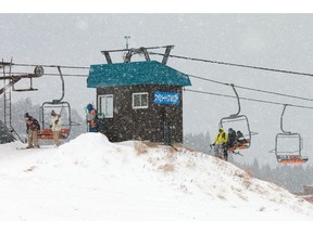 Skiers disembark a chairlift at Hachi Kogen Ski Resort in Hyogo Prefecture. Energy costs are squeezing many of Japan's smaller ski resorts hard.