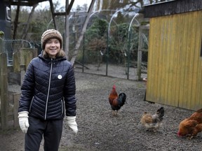 Swedish climate campaigner Greta Thunberg smiles during an interview with the Associated Press in Erkelenz, Germany, Saturday, Jan. 14, 2023. Ahead of a demonstration in which she will take part nearby on Saturday, Thunberg on Friday visited the tiny village of Luetzerath and took a look at the nearby Garzweiler open coal mine.