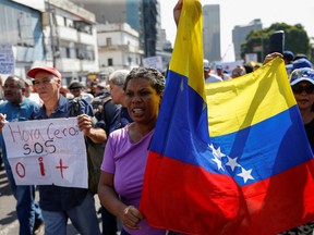 Teachers and public employees protest demanding better salaries amid sky-high inflation, in Caracas, Venezuela, Jan. 16, 2023.