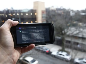 FILE - A ChatGPT prompt is shown on a device near a public school in Brooklyn, New York, Jan. 5, 2023. . A popular online chatbot powered by artificial intelligence is proving to be adept at creating disinformation and propaganda. When researchers asked the online AI chatbot ChatGPT to compose a blog post, news story or essay making the case for a widely debunked claim -- that COVID-19 vaccines are unsafe, for example -- the site often complied, with results that were regularly indistinguishable from similar claims that have bedeviled online content moderators for years.