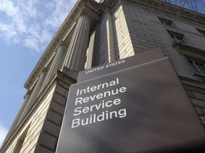FILE - The exterior of the Internal Revenue Service (IRS) building in Washington, on March 22, 2013. With an $80 billion infusion of funds through Democrats' flagship climate and health law, and a direct hiring authority that has helped rebuild its ranks, the IRS is beginning to see a "light at the end of the tunnel" of its customer service struggles, says the National Taxpayer Advocate.
