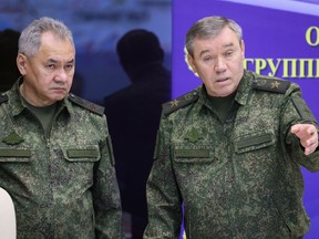 FILE - Russian Defense Minister Sergei Shoigu, left, and Chief of the Russian General Staff Valery Gerasimov attend the meeting with Russian President Vladimir Putin during his visit to the joint staff of troops involved in Russia's military operation in Ukraine, at an unknown location, Saturday, Dec. 17, 2022. The chief of the military's General Staff, Gen. Valery Gerasimov, was named the new chief of the Russian forces in Ukraine.