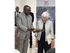 U.S. Treasury Secretary Janet Yellen receives a plaque bearing her name that commemorates the opening of the Zambia National Public Health Institute's Public Health Emergency Operations Centre on Monday, Jan. 23, 2023, in Lusaka, Zambia.