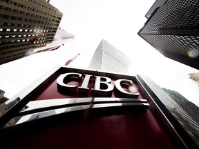 A CIBC sign is shown in the financial district in Toronto on Tuesday, August 22, 2017.