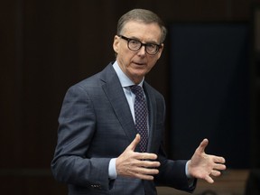 Bank of Canada Governor Tiff Macklem waits to appear before the Finance committee, Thursday, February 16, 2023 in Ottawa.