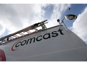POMPANO BEACH, FL - FEBRUARY 13: A Comcast truck is seen parked at one of their centers on February 13, 2014 in Pompano Beach, Florida. Today, Comcast announced a $45-billion offer for Time Warner Cable.