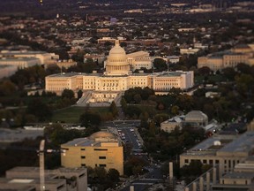 (EDITORS NOTE: Image was created using a variable planed lens.) The U.S. Capitol is seen in this aerial photograph taken with a tilt-shift lens above Washington, D.C., U.S., on Tuesday, Nov. 4, 2019. Democrats and Republicans are at odds over whether to provide new funding for Trump's signature border wall, as well as the duration of a stopgap measure. Some lawmakers proposed delaying spending decisions by a few weeks, while others advocated for a funding bill to last though February or March.