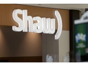 Signage on a Shaw store in the CF Polo Park mall in Winnipeg, Manitoba, Canada, on Monday, March 15, 2021. Rogers Communications Inc. agreed to buy rival Shaw Communications Inc. in a C$20 billion ($16 billion) deal that would unite Canada's two largest cable providers and shake up its wireless industry. Photographer: Shannon VanRaes/Bloomberg