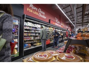 Shoppers inside a grocery store in San Francisco, California, U.S., on Monday, May 2, 2022. U.S. inflation-adjusted consumer spending rose in March despite intense price pressures, indicating households still have solid appetites and wherewithal for shopping.