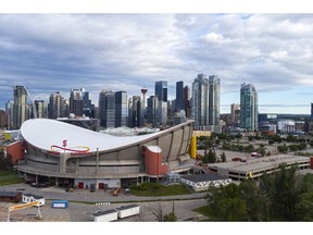 The Scotiabank Saddledome in front of downtown Calgary, Alberta, Canada, on Monday, June 20, 2022. Calgary, surrounded by fields of oil, natural gas, wheat and barley that make Canada a global exporting powerhouse, is at the epicenter of a post-Covid economic expansion. Photographer: Gavin Bryan John/Bloomberg
