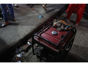 A generator provides power to a restaurant during the power outage in Dhaka, Bangladesh, on Tuesday, Oct. 4, 2022. Nearly half of Bangladesh was left without electricity on Tuesday after a transmission line tripped, discomforting citizens in the humid autumn weather. Photographer: Anik Rahman/Bloomberg