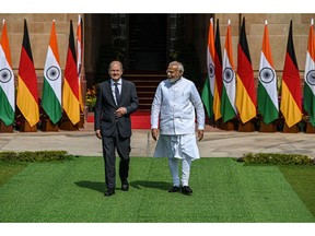 Olaf Scholz, Germany's chancellor, left, with Narendra Modi, India's prime minister at Hyderabad House in New Delhi, India, on Saturday, Feb. 25, 2023. Scholz wants to use his first visit to India as German chancellor this weekend to strengthen business ties with the world's most populous democracy and deepen cooperation in areas including green energy, climate protection and defense. Photographer: Prakash Singh/Bloomberg