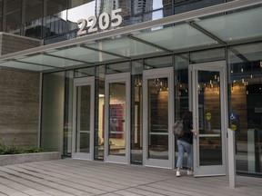 A worker enters the Amazon headquarters campus in the South Lake Union neighbourhood of Seattle.