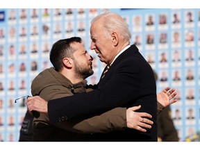Joe Biden greeted by Volodymyr Zelensky during a visit in Kyiv on February 20. Photographer: Dimitar Dilkoff/AFP/Getty Images