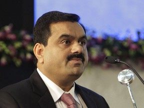 Gautam Adani speaks during the inauguration of Vibrant Gujarat Global Investor summit in Gandhinagar, India, Jan. 12, 2011. Embattled Indian billionaire Adani called off his flagship company's $2.5 billion share sale late Wednesday, Feb. 1. 2023, after a tumultuous week saw his conglomerate shed tens of billions of dollars in market value after claims of fraud from a U.S.-based short-selling firm.