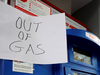 Out of gas sign on a pump