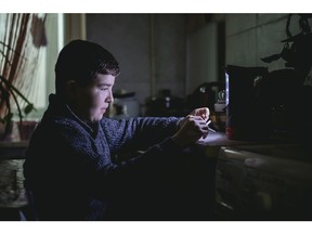 Vladik (12) is sometimes forced to do his homework in his kitchen under emergency lighting during blackouts in Vyshgorod. Canadian donations to Children Believe, a member of the ChildFund Alliance, is aiding support efforts for families to receive food, warm clothing and access to education.