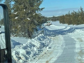 Snow clearing efforts begin, crew working on path to gravel pit at Key Lake South Project