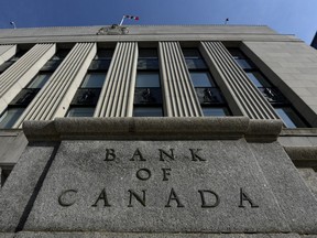 The Bank of Canada building is seen on Wellington Street in Ottawa, on Tuesday, May 31, 2022. Bank of Canada deputy governor Paul Beaudry says returning to the two per cent inflation target is critical because high and volatile inflation makes the economy inefficient and businesses less competitive.THE CANADIAN PRESS/Justin Tang