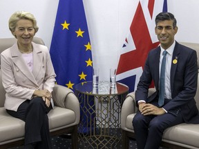 FILE - European Commission President Ursula von der Leyen, left, and British Prime Minister Rishi Sunak meet during the COP27 climate summit in Sharm el-Sheikh, Egypt, Nov. 7, 2022. British Prime Minister Rishi Sunak and European Union leader Ursula von der Leyen are due to meet, the two sides said Sunday Feb. 26, 2023, with expectations high they will seal a deal to resolve a thorny post-Brexit trade dispute.