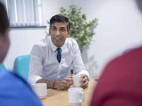 Britain's Prime Minister Rishi Sunak during a visit to Oldham Community Diagnostic Centre in Oldham, England, Monday, Feb. 13, 2023.