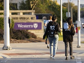 Students walking at the Western University campus in London, Ont.