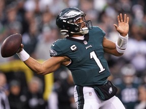 FILE - Philadelphia Eagles quarterback Jalen Hurts passes during the first half of the NFC Championship NFL football game between the Philadelphia Eagles and the San Francisco 49ers on Sunday, Jan. 29, 2023, in Philadelphia. The Chiefs and Eagles are bringing MVP finalists Patrick Mahomes and Jalen Hurts to the Super Bowl to cap a season in which the NFL had a glaring amount of instability at quarterback.