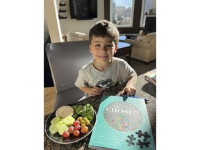 This October 2022 photo provided by Kristin Stonehouse shows her son, Mason Stonehouse, 6, in Chesterfield, Mich. Mason Stonehouse used his father's Grubhub account to order $1,000 worth of food delivered to his home on Saturday, Jan. 28, 2023. His father, Keith Stonehouse, was not aware his son was ordering the food and at first did nt understand why delivery people kept ringing his doorbell and leaving food. (Kristin Stonehouse via AP)