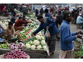 A market in Islamabad on February 3. Photographer: Aamir Qureshi/AFP/Getty Images