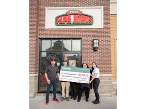 Funds from Shaq-A-Roni pizza sales being presented to Second Harvest in Canada