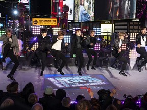FILE - Korean pop band BTS performs at the Times Square New Year's Eve celebration in New York on Dec. 31, 2019. Hybe, the South Korean entertainment company behind K-pop sensation BTS, said Wednesday, Feb. 22, 2023, it has completed its acquisition of a 14.8% stake in rival SM Entertainment, making it SM's largest single shareholder.