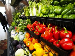 Produce vegetables are displayed for sale at a grocery store in Aylmer, Que., on Thursday, May 26, 2022. Food costs continue to outpace overall inflation, but experts predict grocery prices to begin stabilizing this year as supply chains return to pre-pandemic levels.
