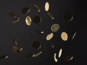 Experts say the outlook for the loonie in 2023 largely depends on commodity prices, how the U.S. dollar fares, and whether central banks are successful in avoiding a major recession. Falling Canadian dollar coins or loonies are pictured in North Vancouver, B.C., Wednesday, May 29, 2019.