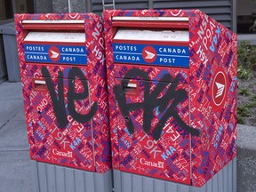 Canada Post says a spike in vandalism has put many of its Toronto mailboxes out of commission. A vandalized Canada Post mailbox is seen Tuesday, May 31, 2016 in Montreal.