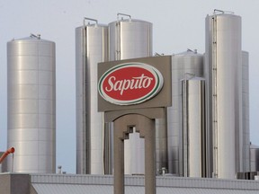 Saputo Inc. will release its third-quarter results after the close of markets on Thursday and hold a conference call on Friday. The company announced a new packaging facility and expanded string cheese operations in the U.S. last week as well as plans to close three facilities. A sign at a Montreal Saputo plant is shown on Jan.13, 2014.